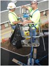 BirdMaster installers in the aerial lift